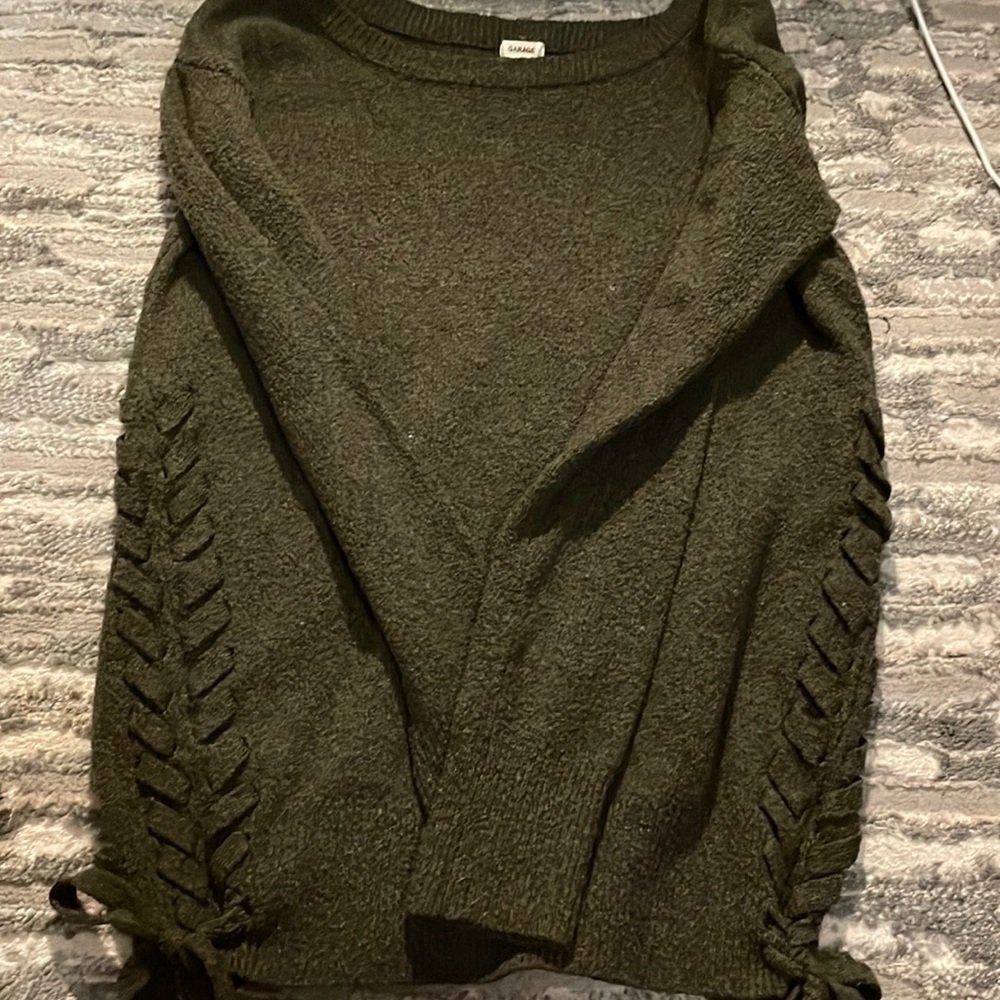 Garage long sleeve with detail on the sides.